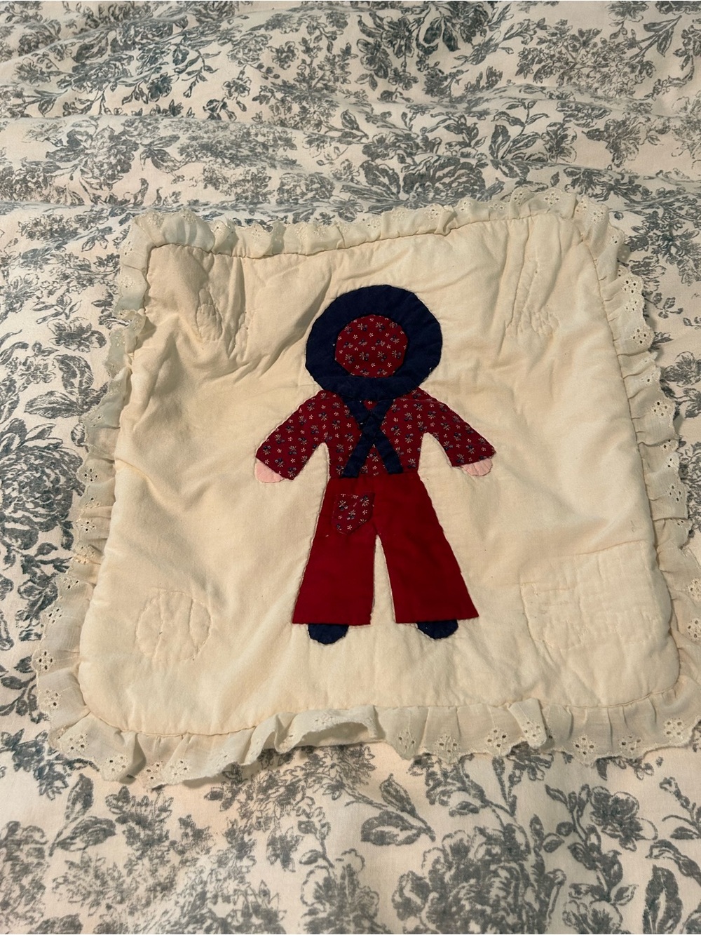 Handmade Appliqué Quilt Square pillowcase with Red & Navy Doll